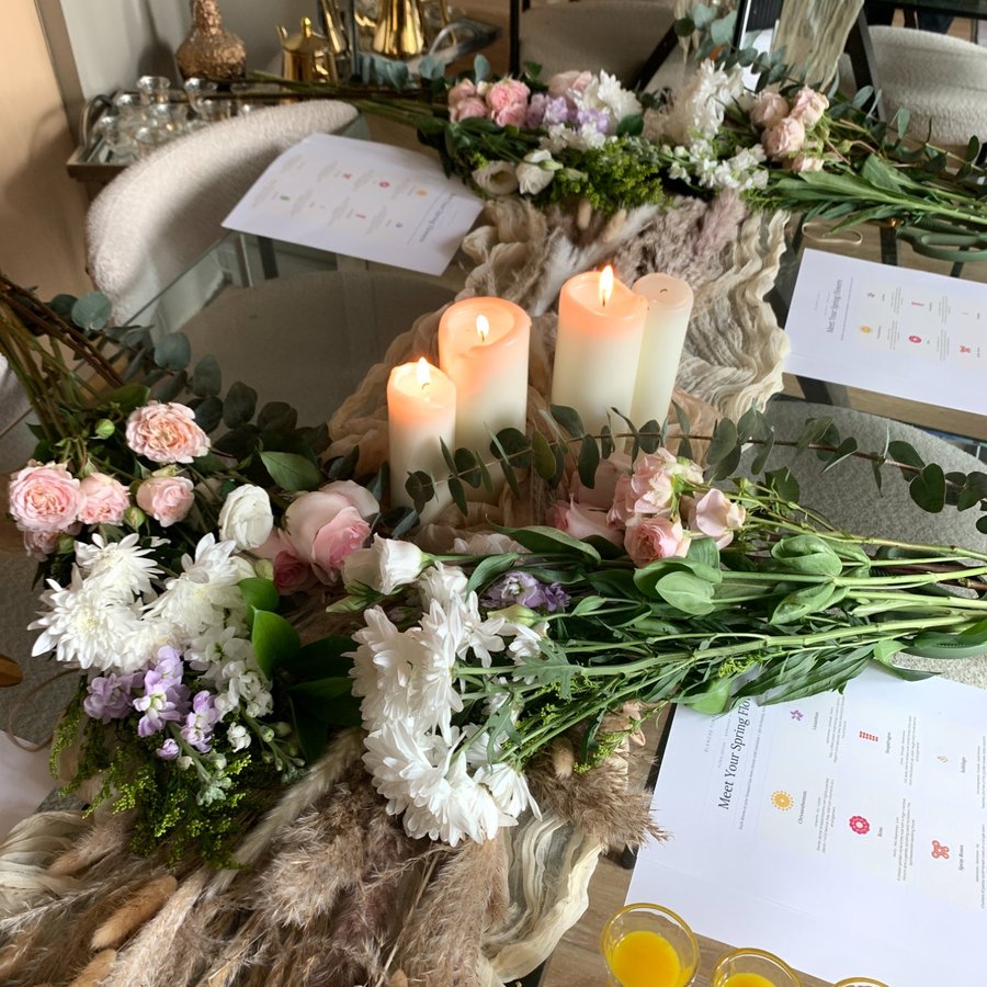 Workshop full table spread with candles and mimosas